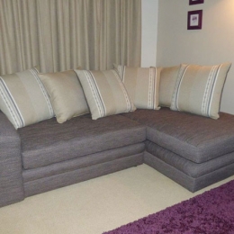 Re-upholstered corner sofa