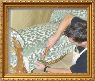 Price Brothers & Sons re-upholstering a sofa